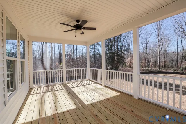 a view of a balcony with wooden floor