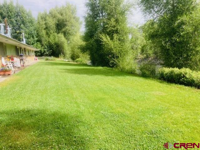 300 Bevington Road Gunnison, CO 81230 - Photo 6 of 6 a view of a house with a big yard