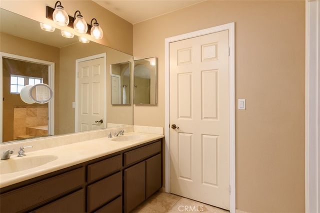 a bathroom with a tub and shower