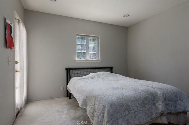 a bathroom with a shower and a sink