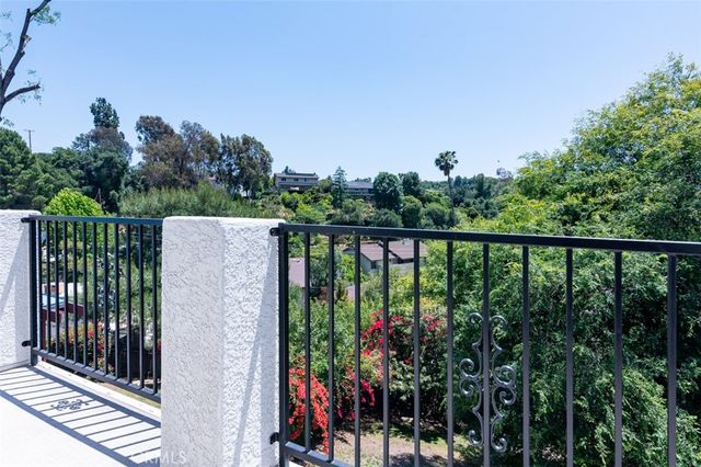 a balcony with an outdoor space