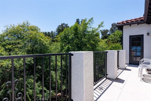 a view of a dining room with furniture and window