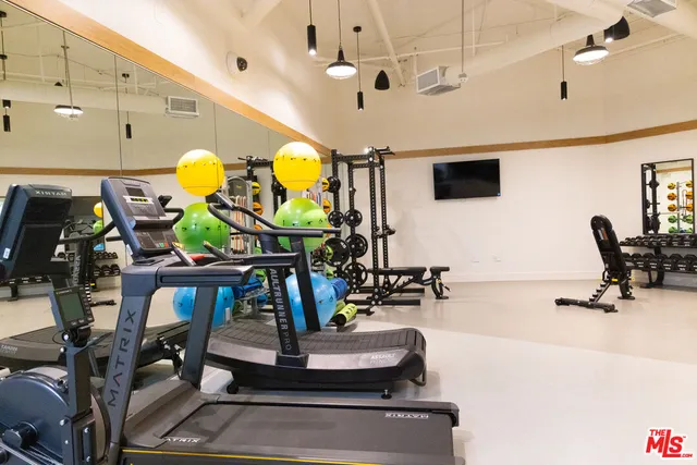 a view of a room with gym equipment