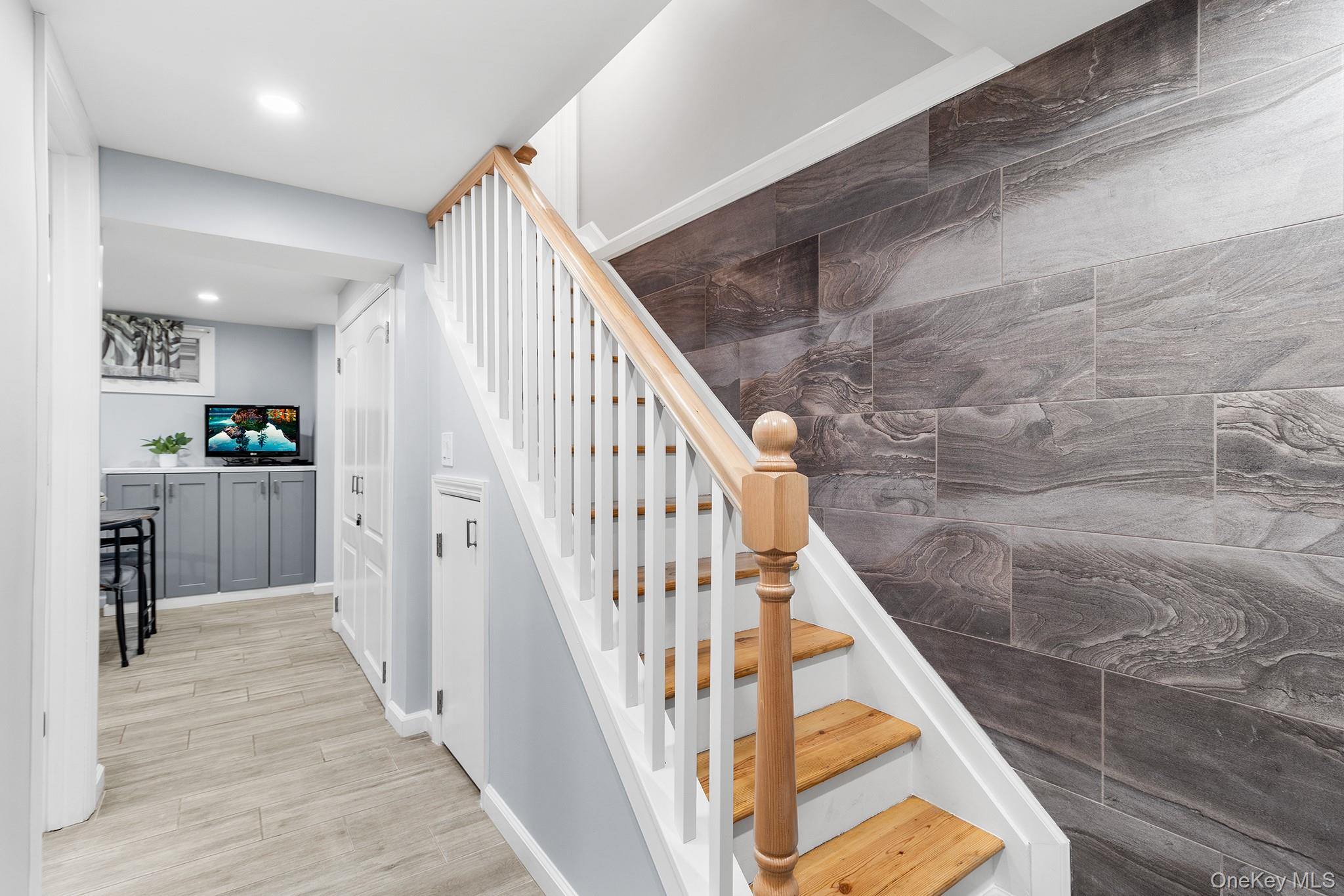164 Colonial Springs Road Wheatley Heights, NY 11798 - Photo 31 of 35 a view of entryway and hall with wooden floor