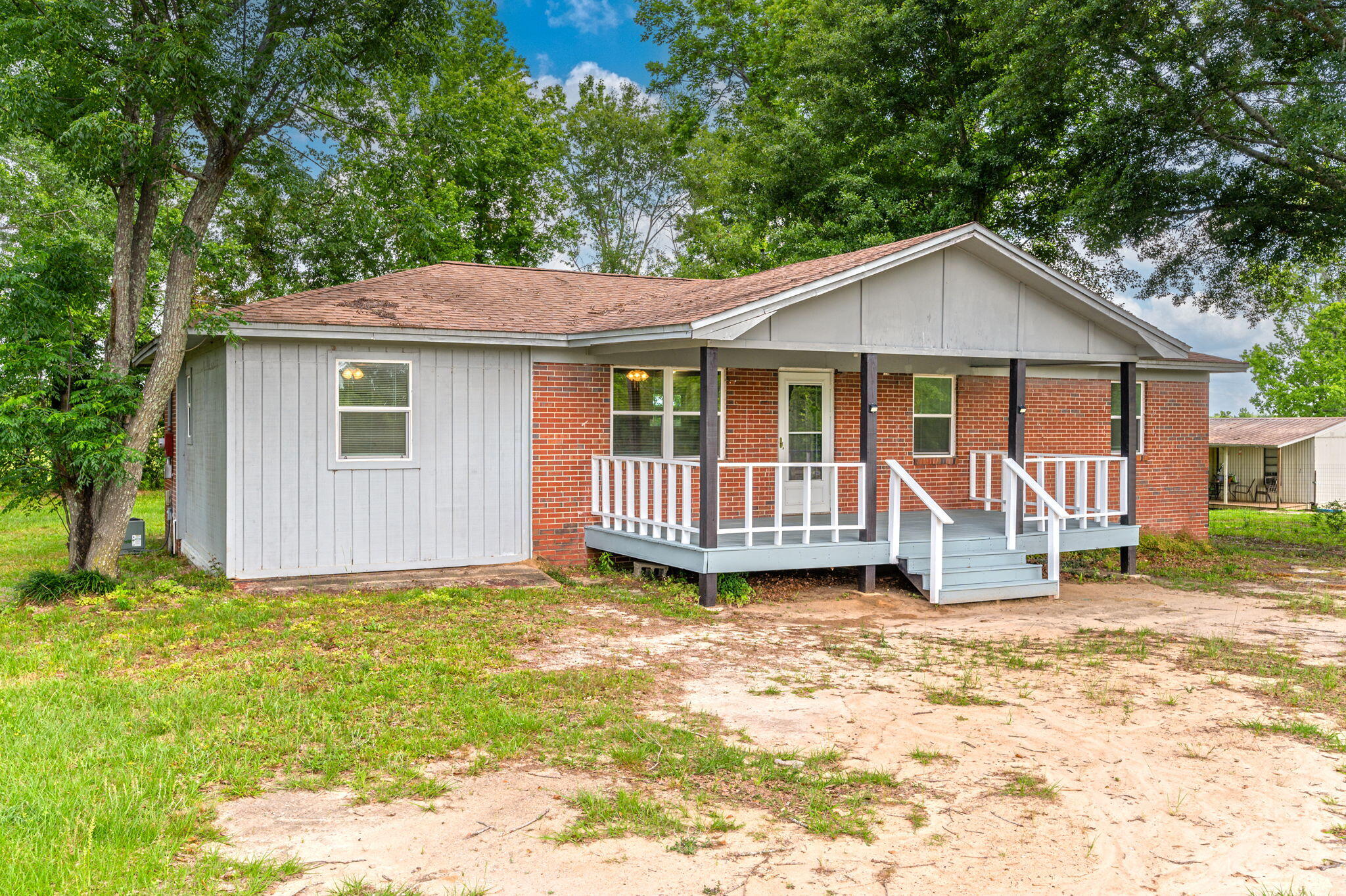 1099 Highway 2 Westville, FL 32464 - Photo 2 of 34 a view of a house with a yard and fence