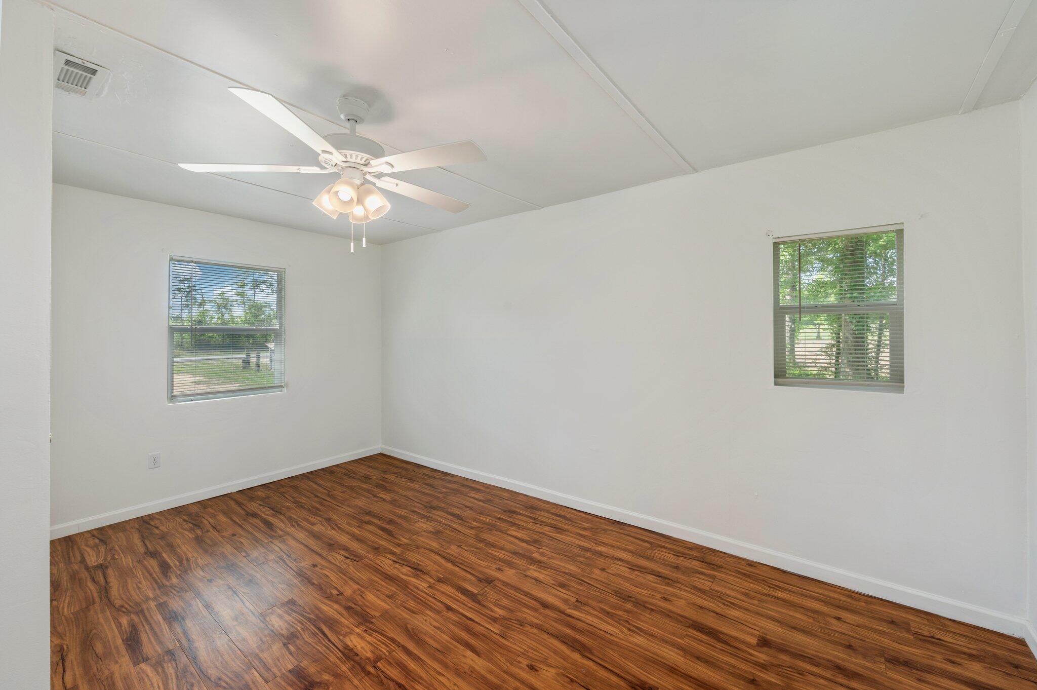 1099 Highway 2 Westville, FL 32464 - Photo 24 of 34 a view of empty room with wooden floor