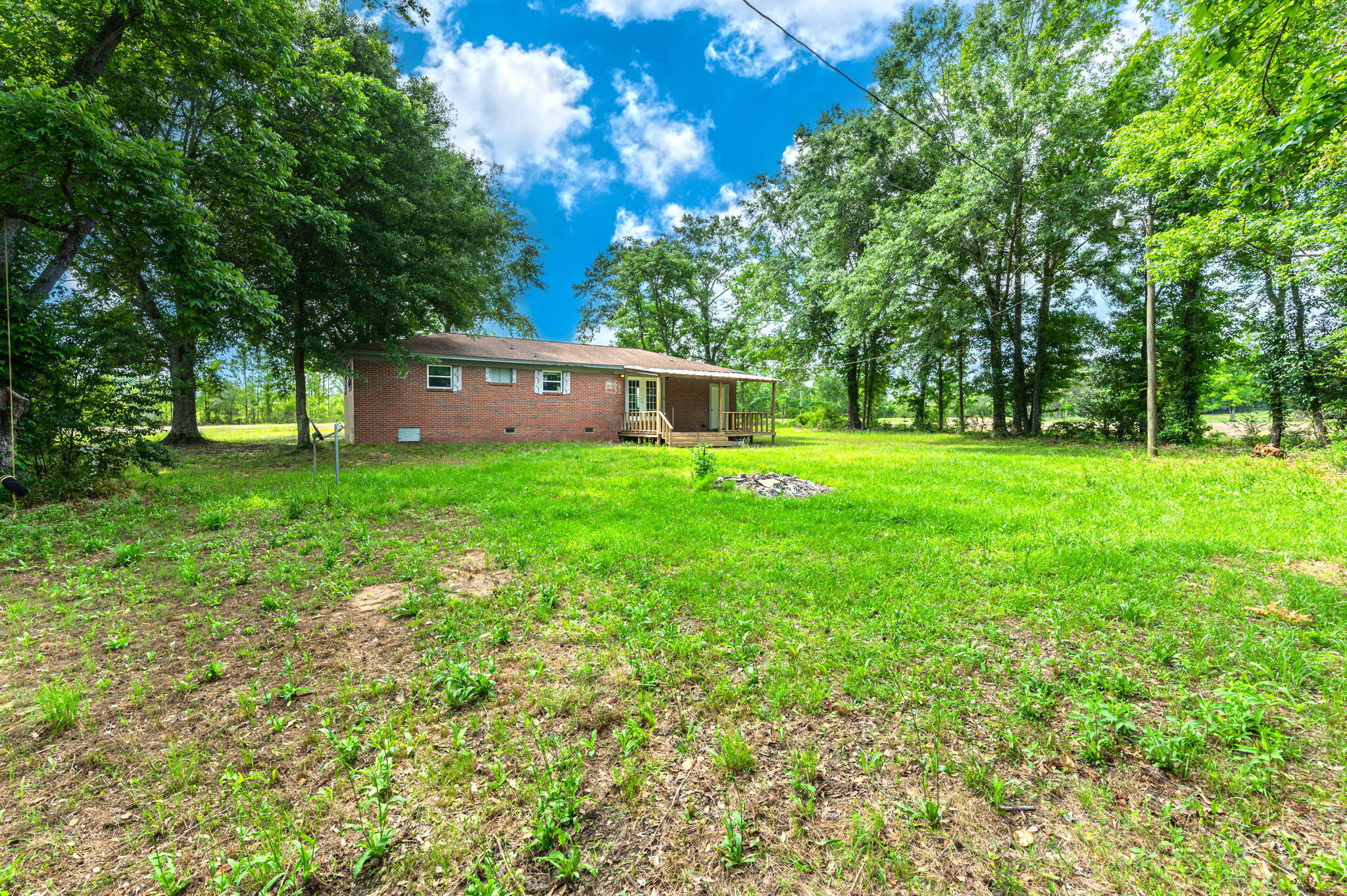 1099 Highway 2 Westville, FL 32464 - Photo 33 of 34 a view of a house with a big yard