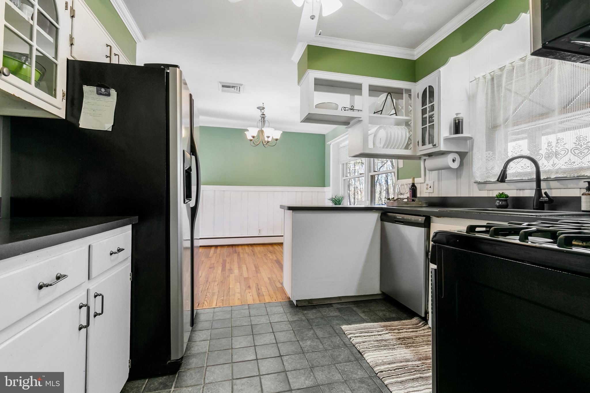 1358 Stokes Road Medford, NJ 08055 - Photo 12 of 36 a kitchen with cabinets and appliances