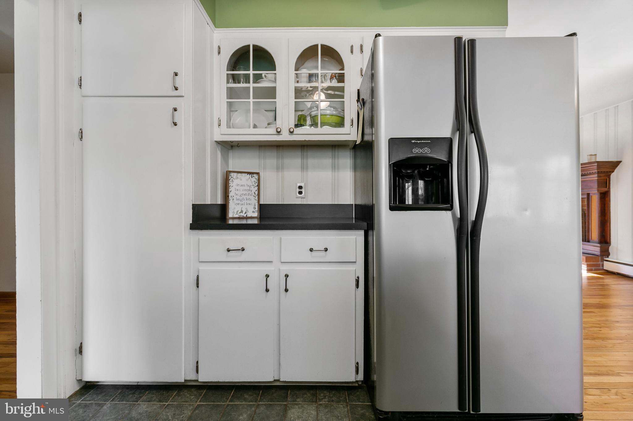 1358 Stokes Road Medford, NJ 08055 - Photo 13 of 36 a kitchen with stainless steel appliances granite countertop a refrigerator and a stove
