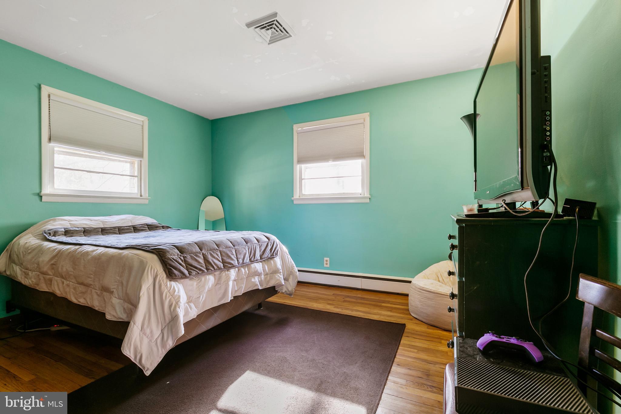 1358 Stokes Road Medford, NJ 08055 - Photo 16 of 36 a bedroom with a bed and a window