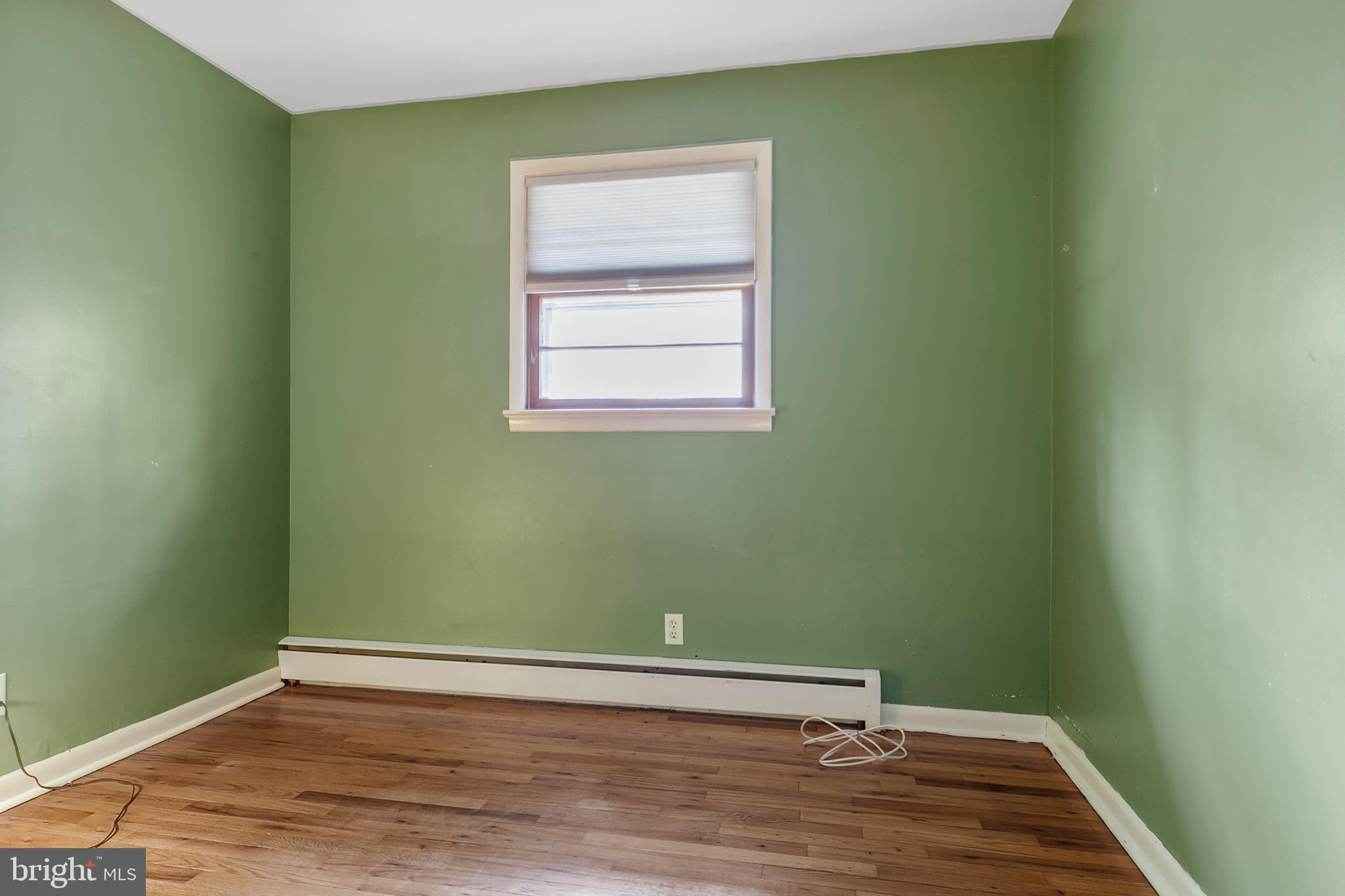 1358 Stokes Road Medford, NJ 08055 - Photo 19 of 36 a view of a room with wooden floor and a window