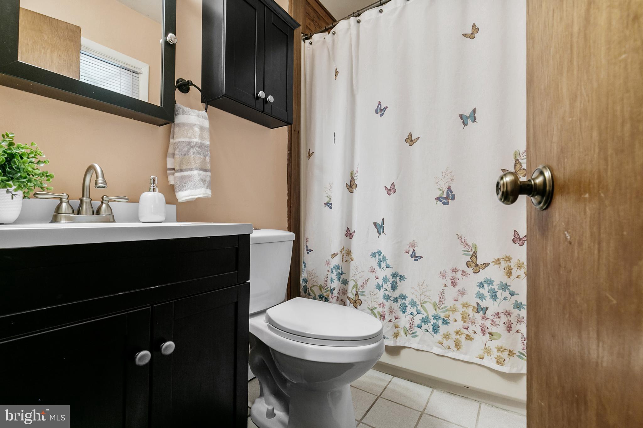 1358 Stokes Road Medford, NJ 08055 - Photo 21 of 36 a bathroom with a sink toilet and shower