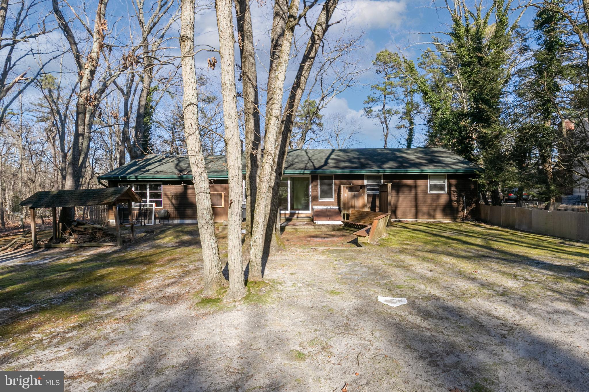 1358 Stokes Road Medford, NJ 08055 - Photo 30 of 36 a view of a house with backyard porch and sitting area