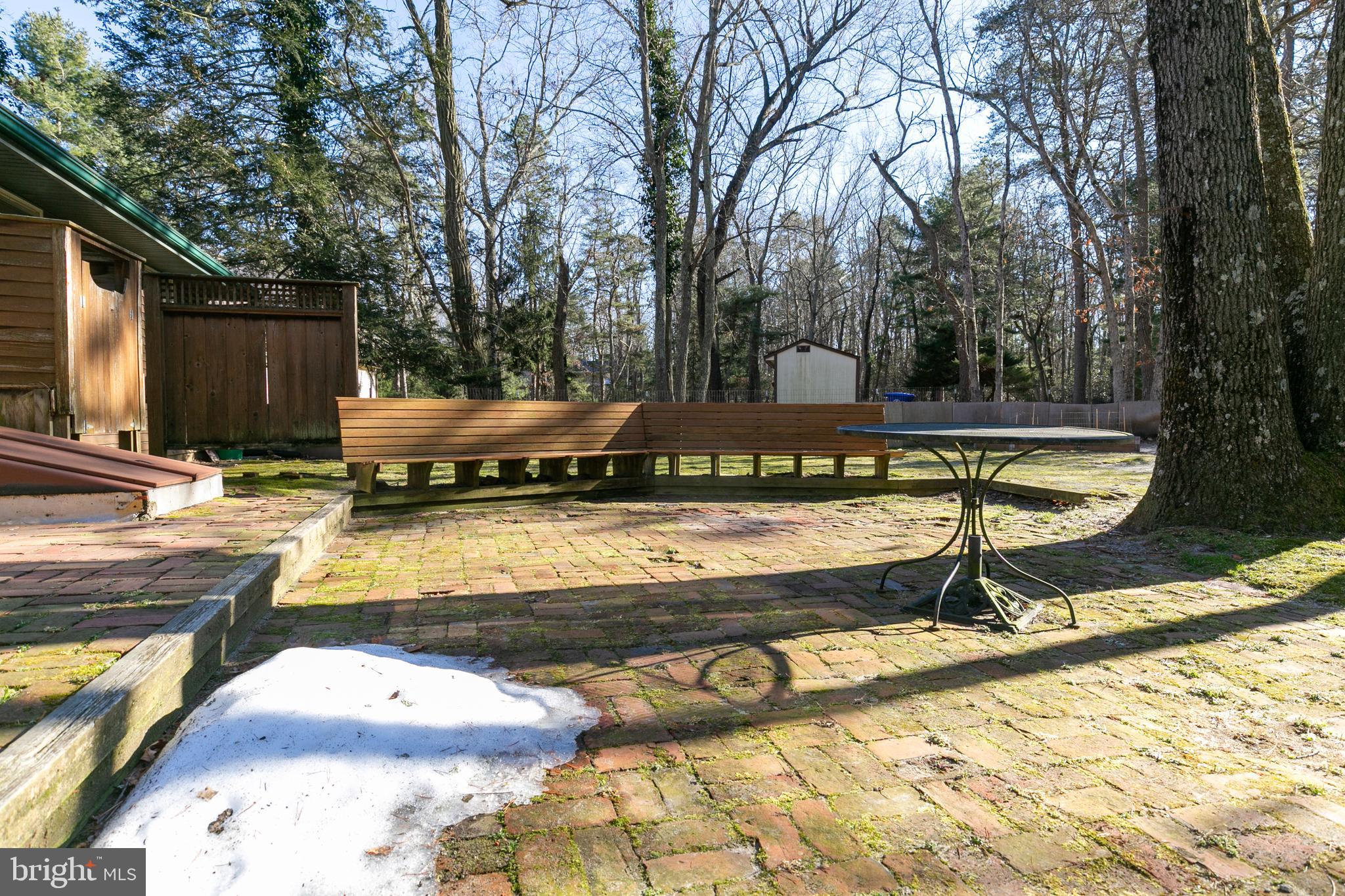 1358 Stokes Road Medford, NJ 08055 - Photo 32 of 36 a view of a swimming pool with a lounge chair