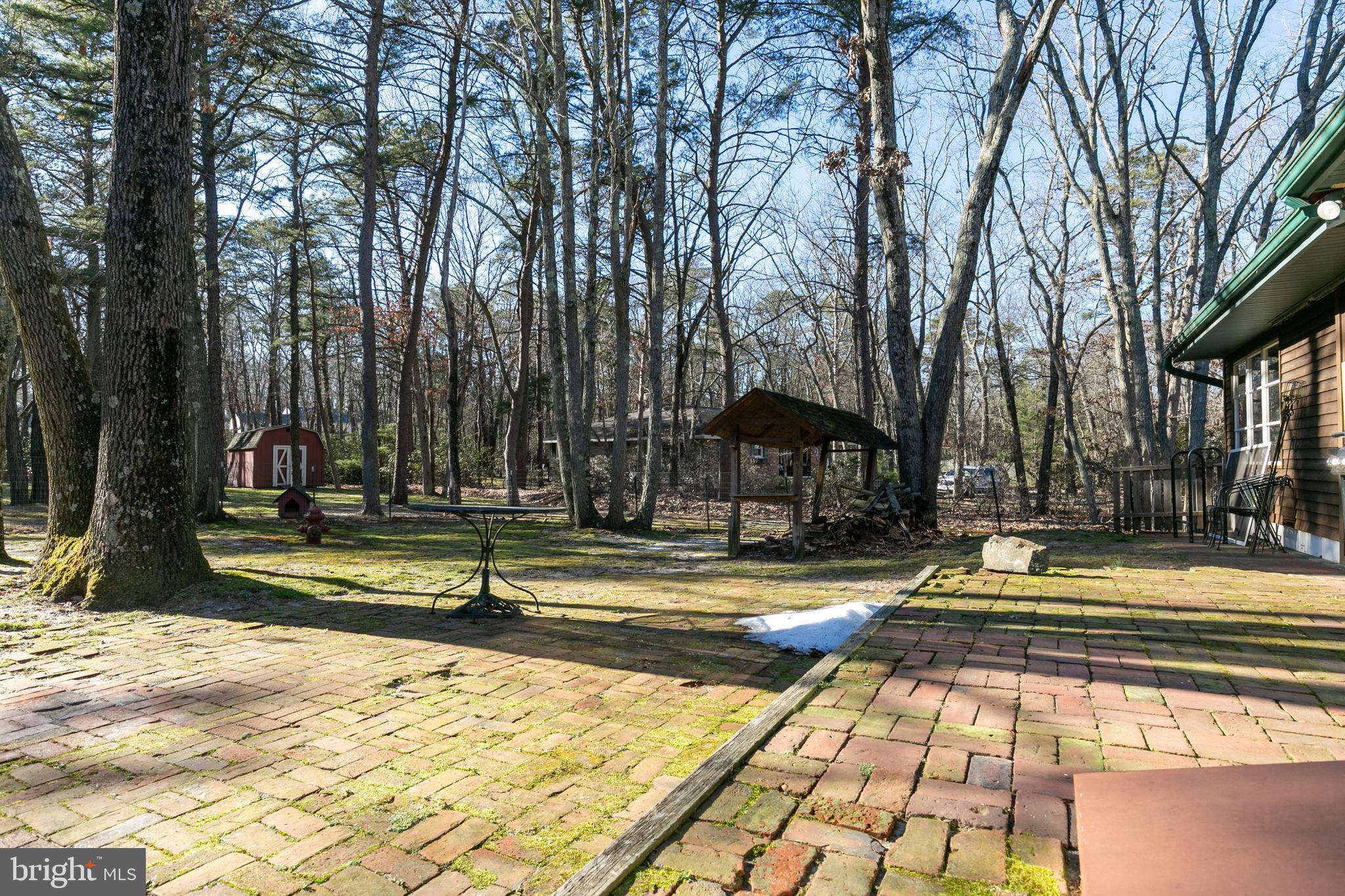 1358 Stokes Road Medford, NJ 08055 - Photo 33 of 36 a view of a swimming pool with an outdoor seating