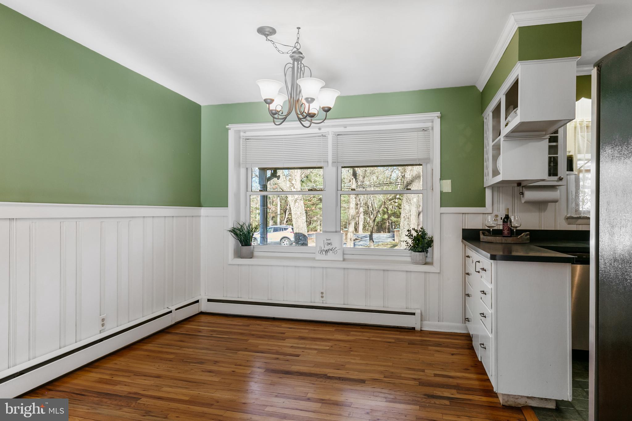 1358 Stokes Road Medford, NJ 08055 - Photo 10 of 36 a kitchen with stainless steel appliances granite countertop a stove a sink and a refrigerator