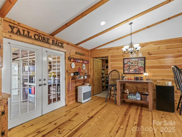 a living room with fireplace furniture and a flat screen tv