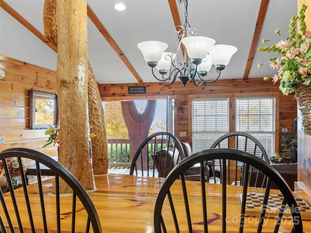 a living room with lots of furniture and a fireplace