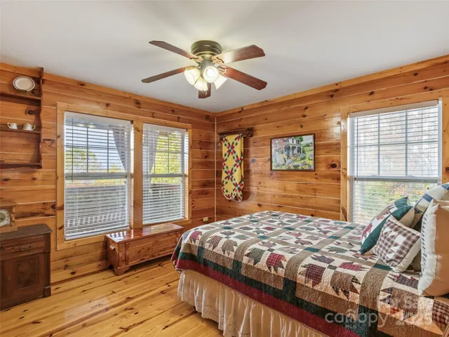 a view of a balcony with wooden floor