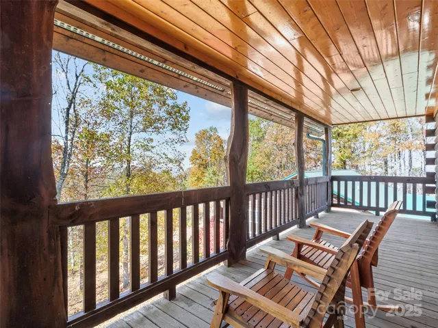 a view of porch with wooden floor and outdoor seating