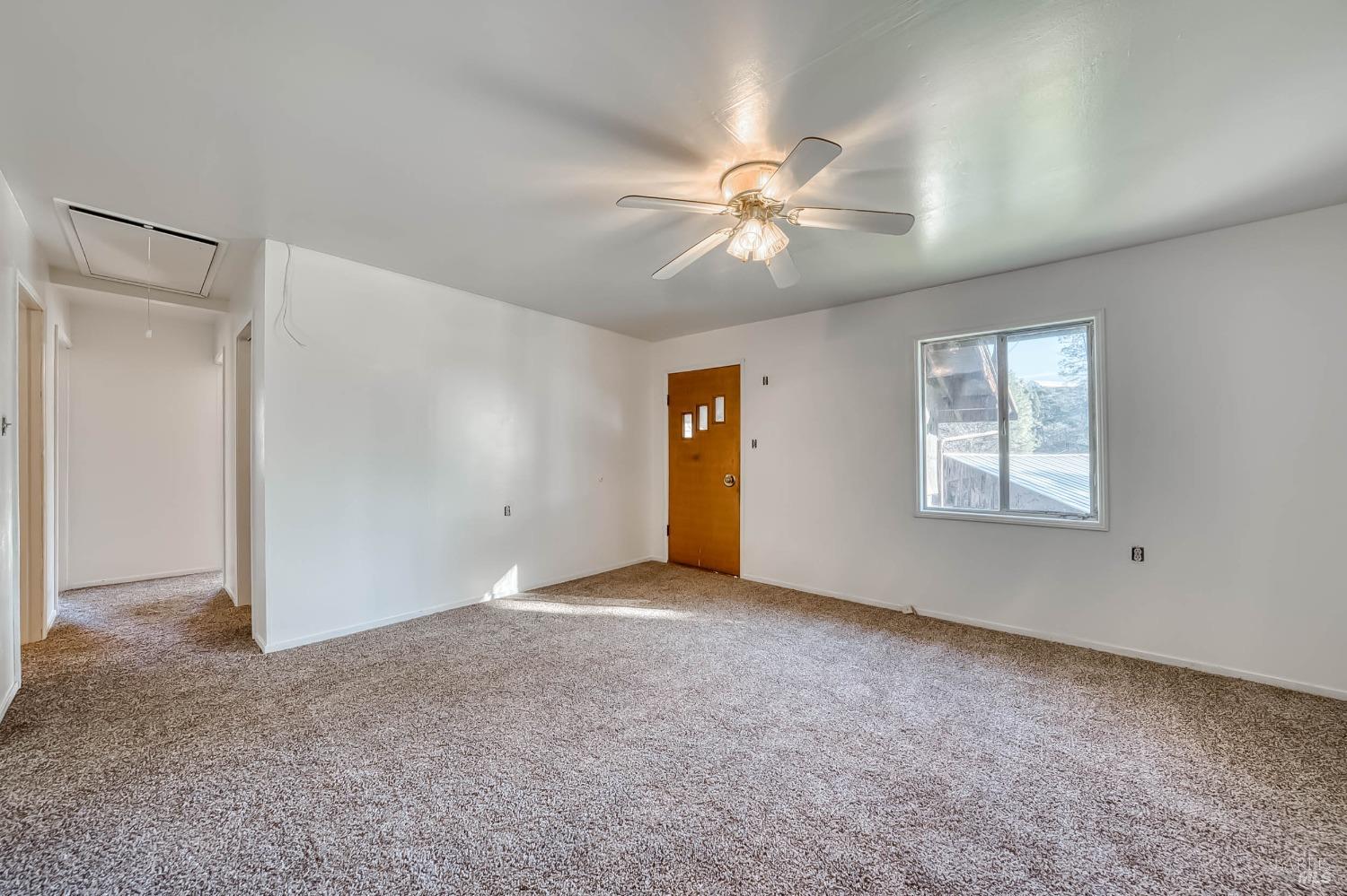 11415 Seigler Springs Road Middletown, CA 95461 - Photo 13 of 52 a view of an empty room with a window