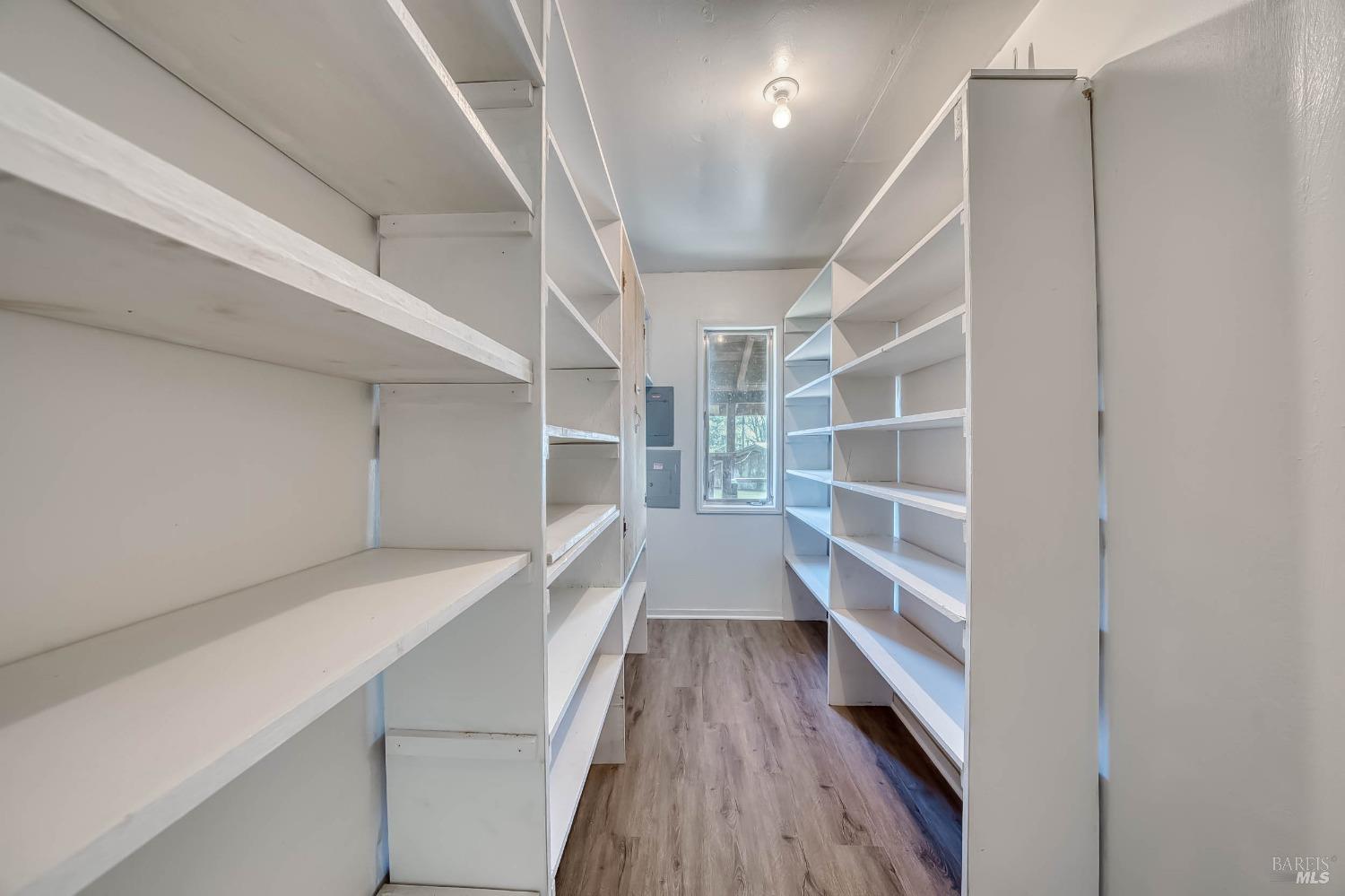 11415 Seigler Springs Road Middletown, CA 95461 - Photo 23 of 52 a view of walk in closet with empty racks