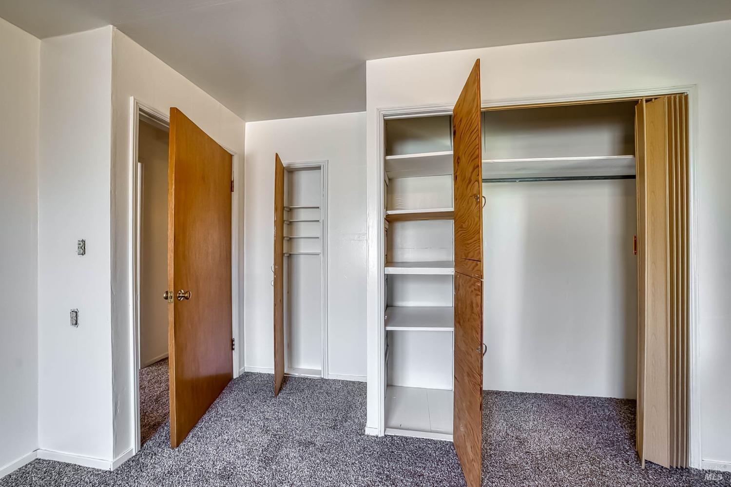 11415 Seigler Springs Road Middletown, CA 95461 - Photo 27 of 52 a view of walk in closet with empty racks