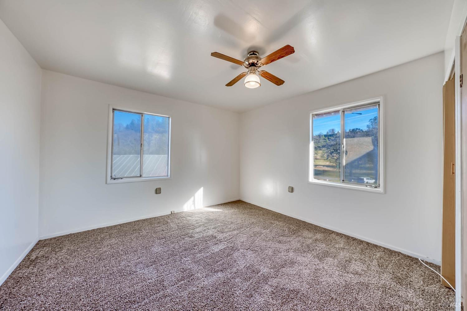 11415 Seigler Springs Road Middletown, CA 95461 - Photo 28 of 52 a view of an empty room with a window