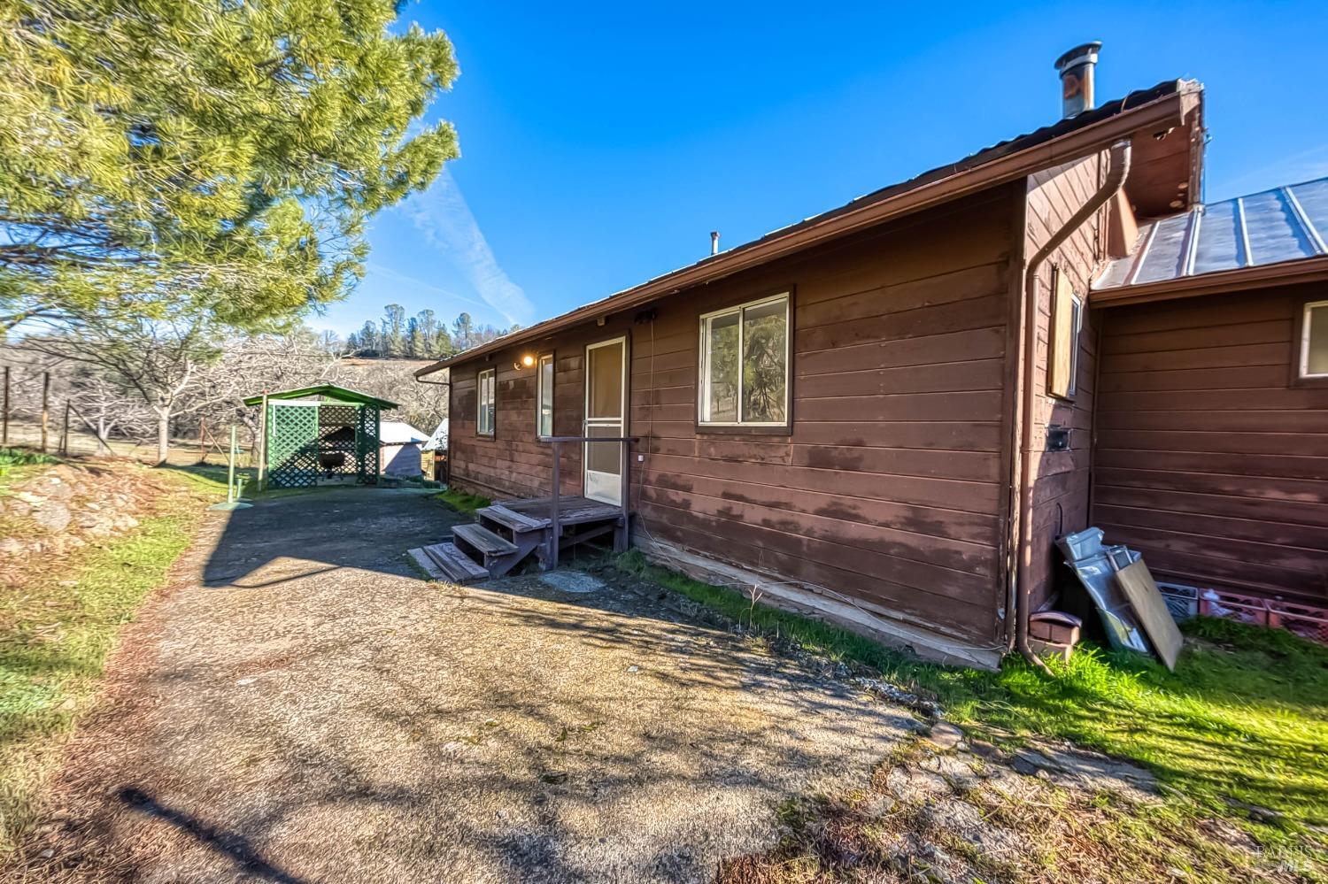 11415 Seigler Springs Road Middletown, CA 95461 - Photo 31 of 52 a view of a house with a yard