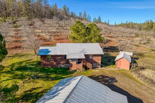 a view of a house with a ocean view