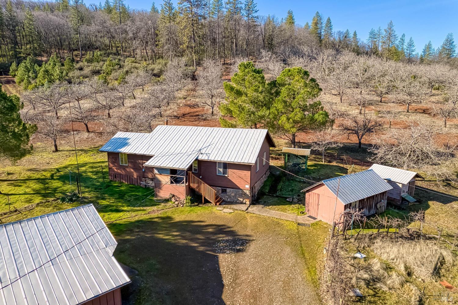 11415 Seigler Springs Road Middletown, CA 95461 - Photo 45 of 52 an aerial view of a house with a yard basket ball court and outdoor seating
