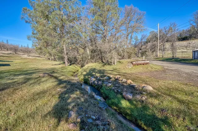 a view of yard with outdoor seating