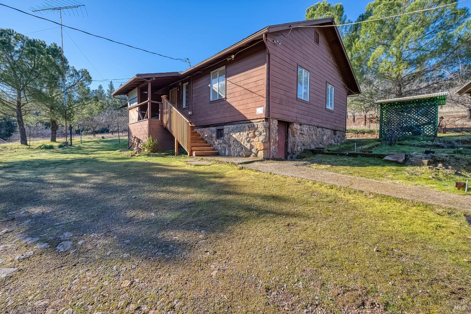 11415 Seigler Springs Road Middletown, CA 95461 - Photo 8 of 52 a view of a house with a yard