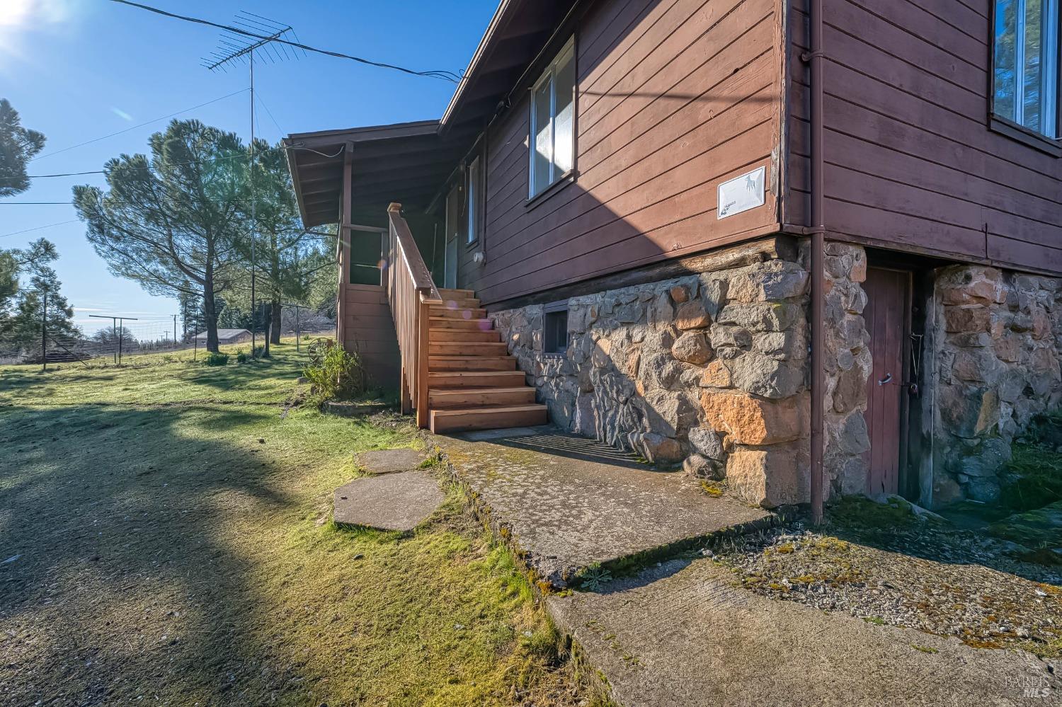 11415 Seigler Springs Road Middletown, CA 95461 - Photo 9 of 52 a view of a house with a yard