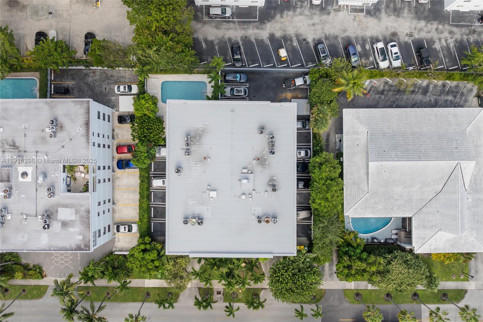 155 Sunrise Drive, Unit 4B Key Biscayne, FL 33149 - Photo 16 of 18 an aerial view of residential house with outdoor space and parking