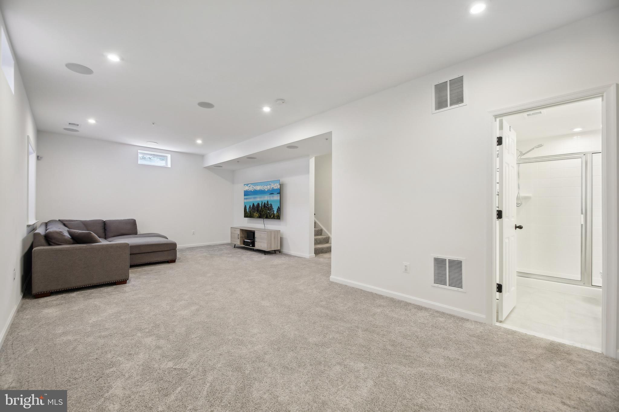 2634 Orchard Oriole Way Odenton, MD 21113 - Photo 35 of 63 a living room with furniture and a couch