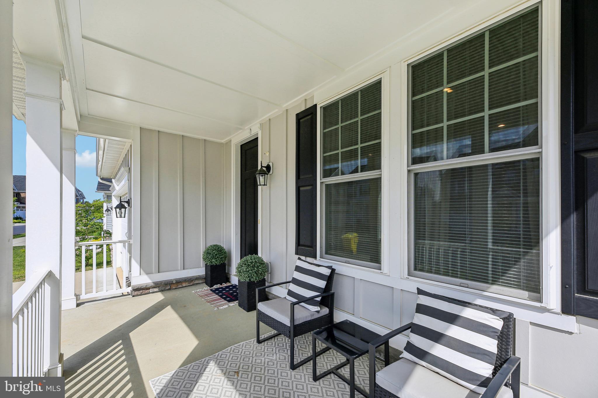 2634 Orchard Oriole Way Odenton, MD 21113 - Photo 4 of 63 a living room with furniture and a large window
