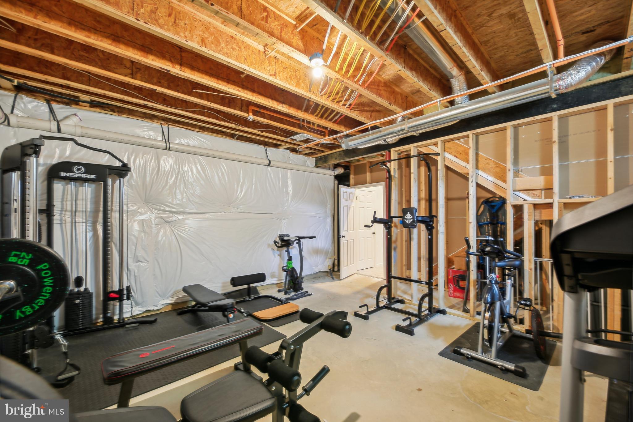 2634 Orchard Oriole Way Odenton, MD 21113 - Photo 41 of 63 a view of a room with gym equipment