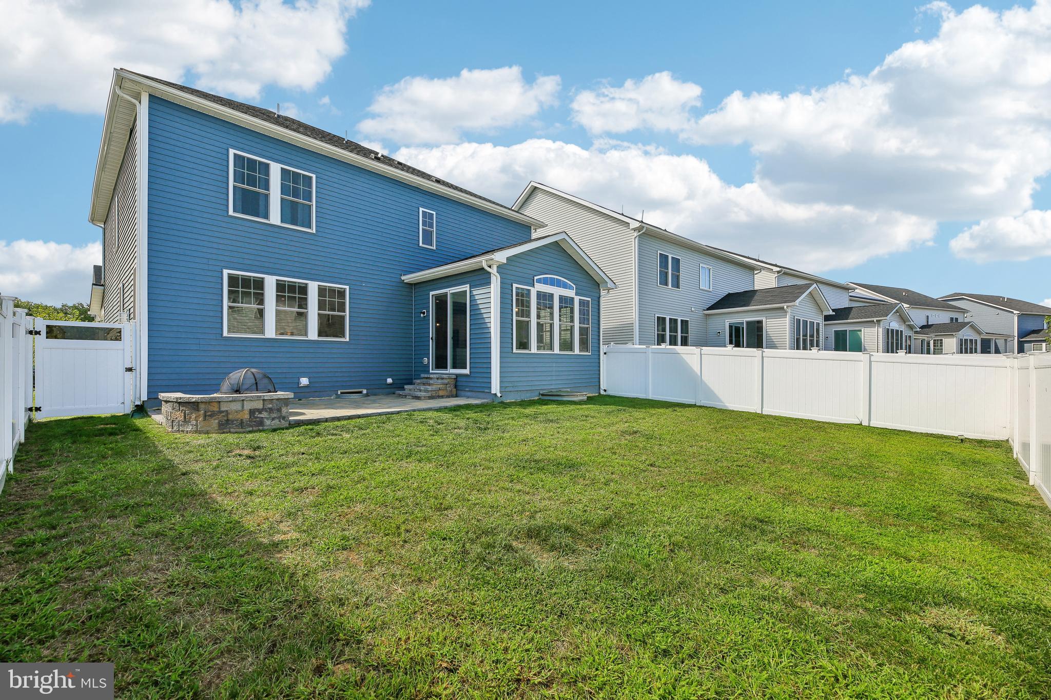 2634 Orchard Oriole Way Odenton, MD 21113 - Photo 44 of 63 a house view with a garden space
