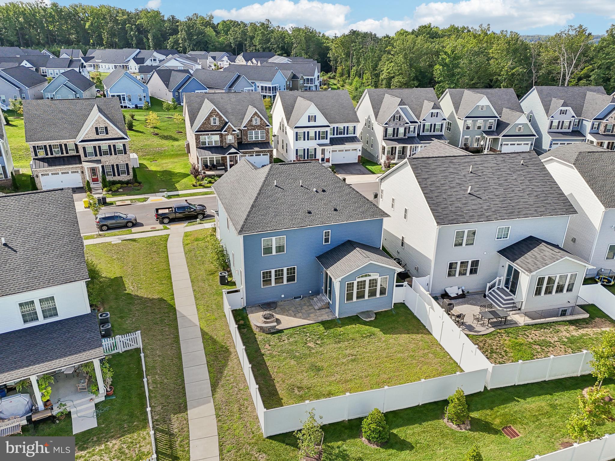 2634 Orchard Oriole Way Odenton, MD 21113 - Photo 46 of 63 an aerial view of a house with swimming pool and big yard