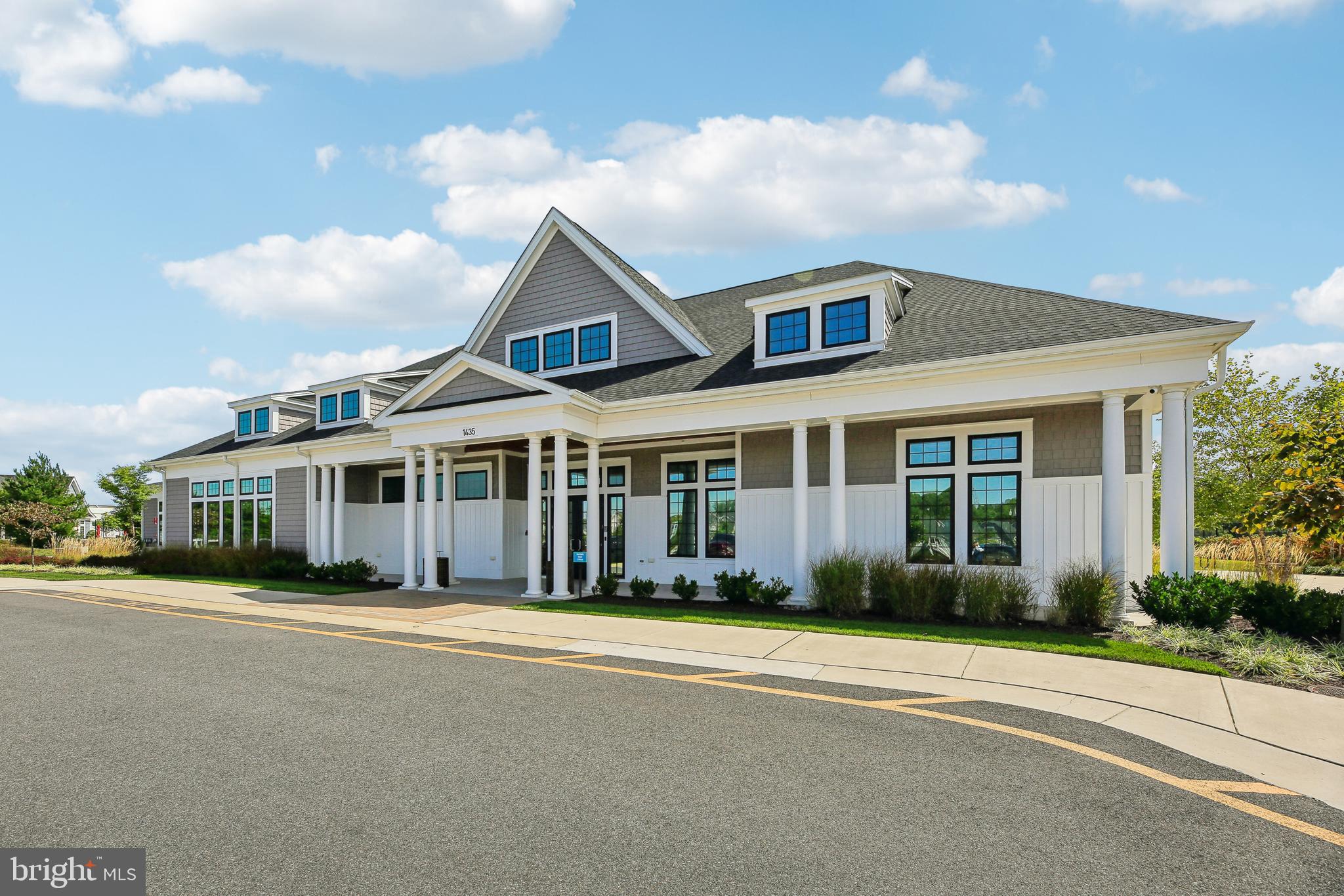 2634 Orchard Oriole Way Odenton, MD 21113 - Photo 57 of 63 a front view of a house with a garden