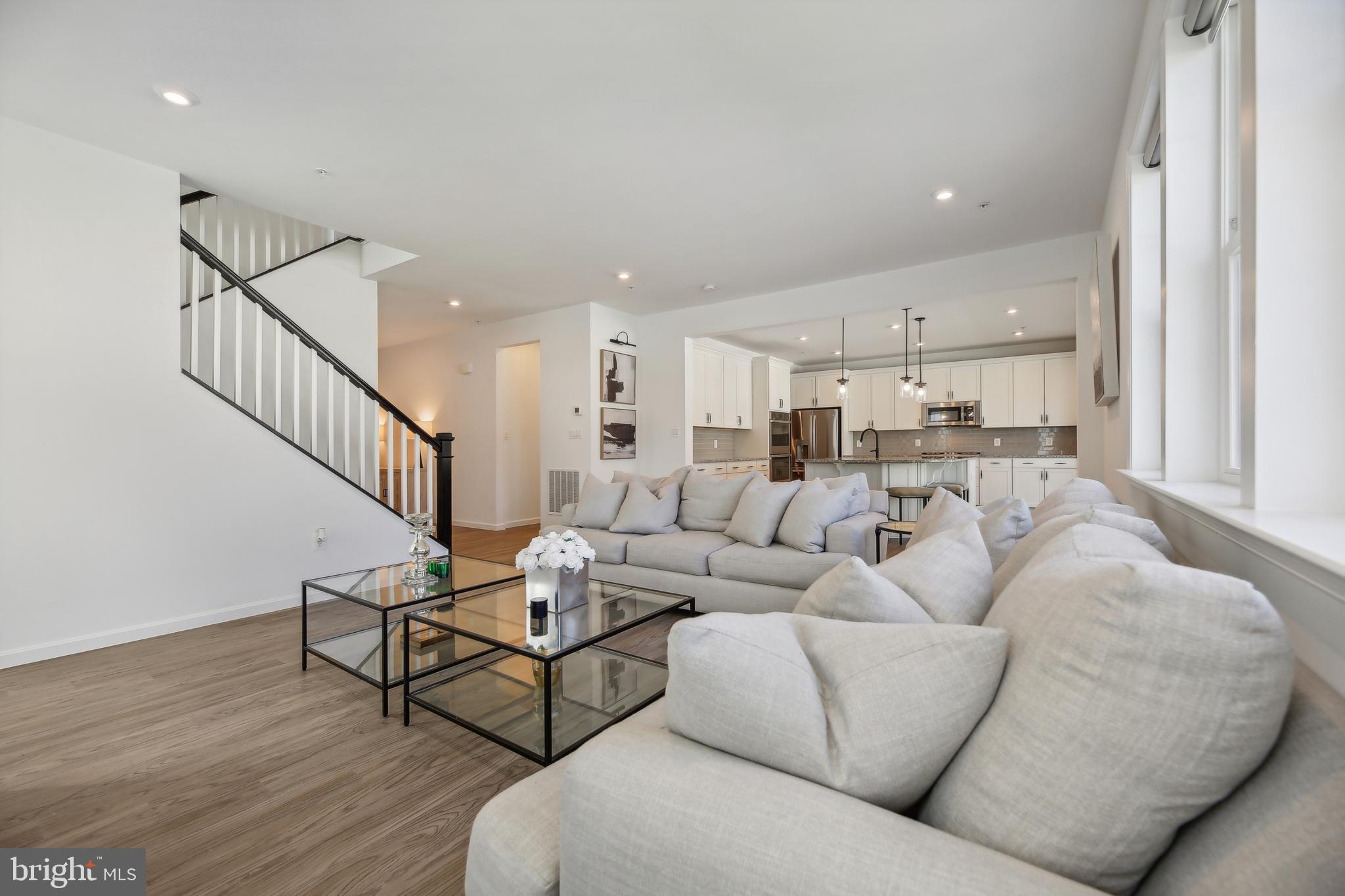 2634 Orchard Oriole Way Odenton, MD 21113 - Photo 8 of 63 a living room with furniture and wooden floor