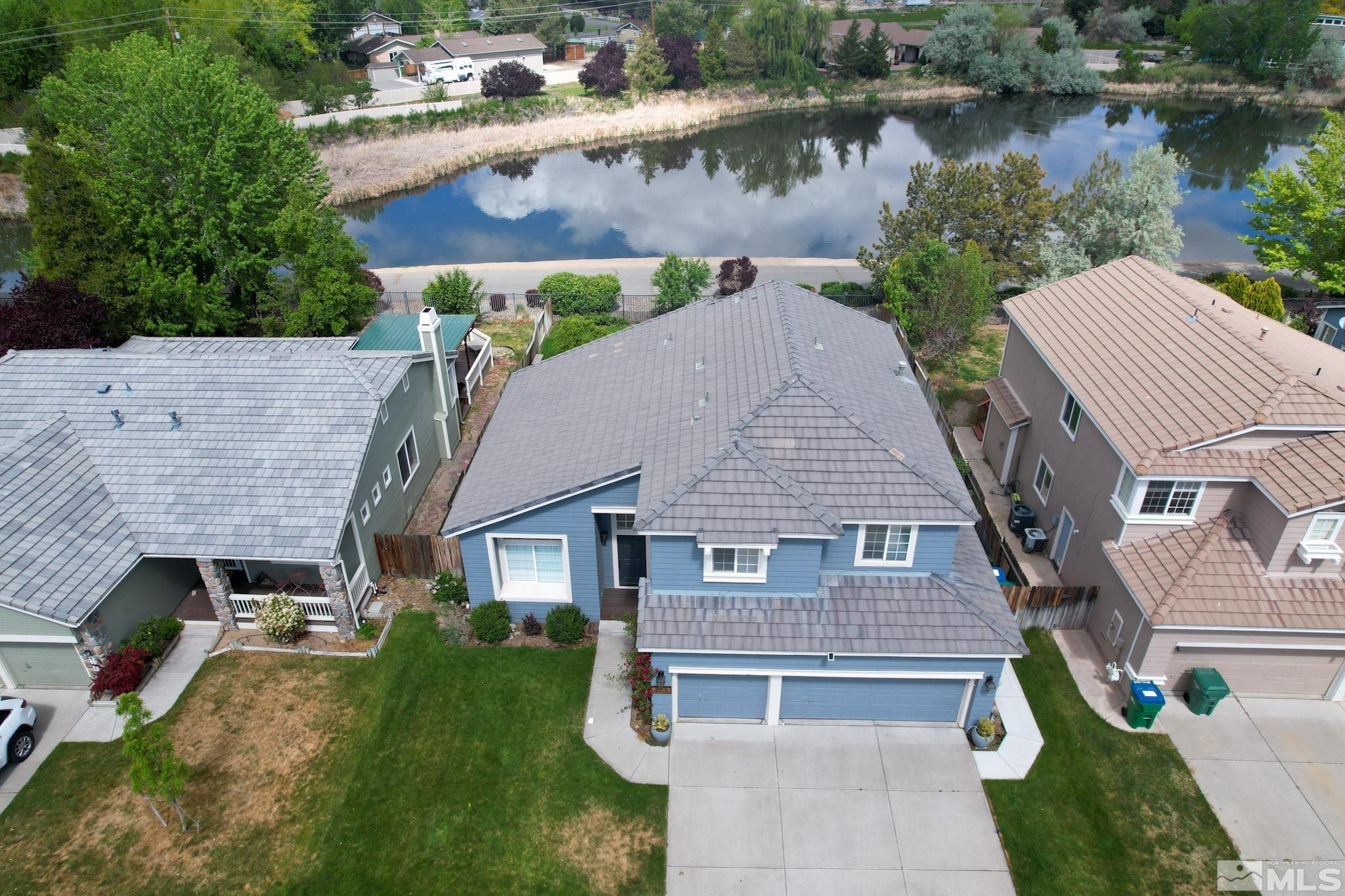 3105 Fairwood Drive Reno, NV 89502 - Photo 1 of 1 an aerial view of a house with yard and lake view
