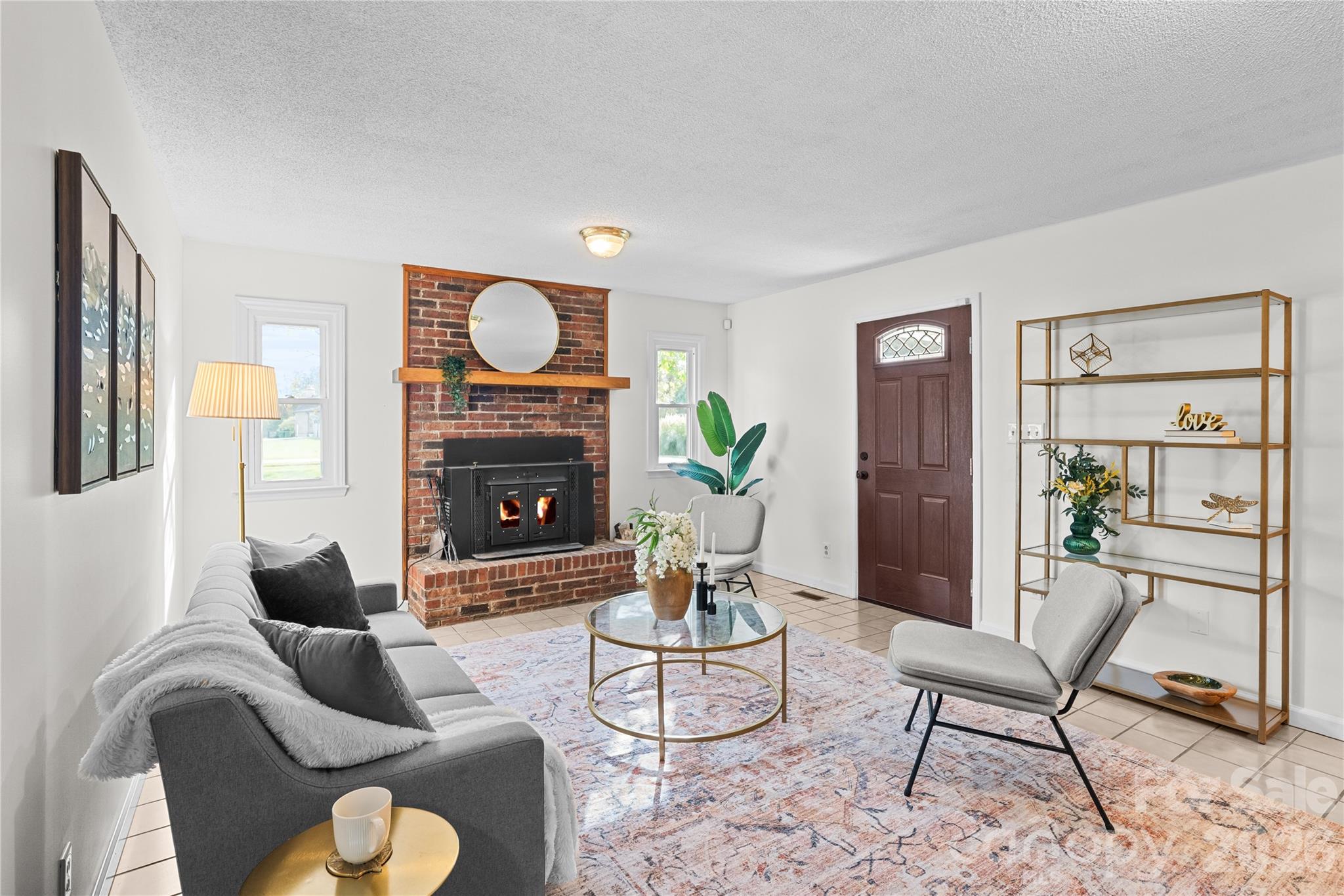 1335 Blacksnake Road Stanley, NC 28164 - Photo 20 of 31 a living room with furniture and a fireplace