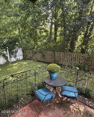 a garden view with a seating space