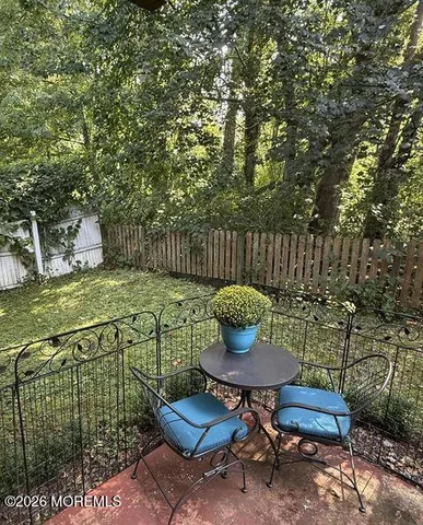 a garden view with a seating space