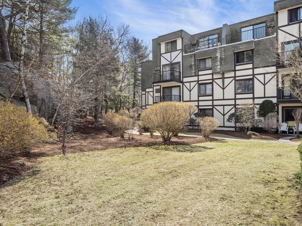 9 Broadway, Unit 110 Saugus, MA 01906 - Photo 24 of 27 a view of a house with yard and sitting area