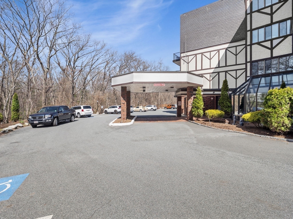 9 Broadway, Unit 110 Saugus, MA 01906 - Photo 4 of 27 a view of a street with cars