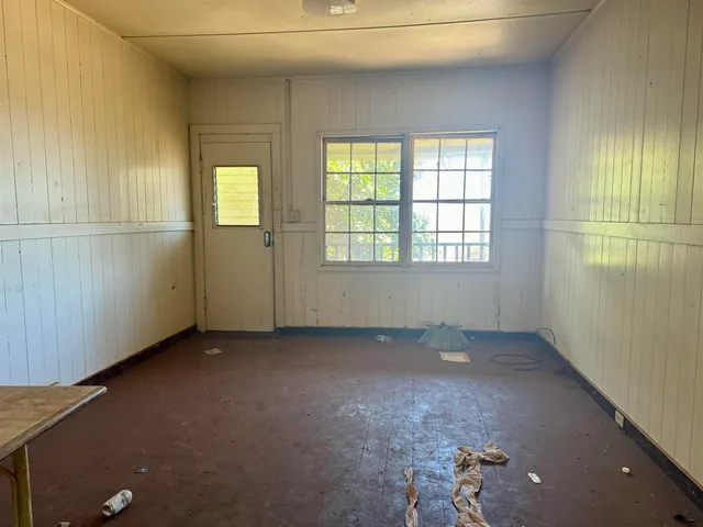 an empty room with windows