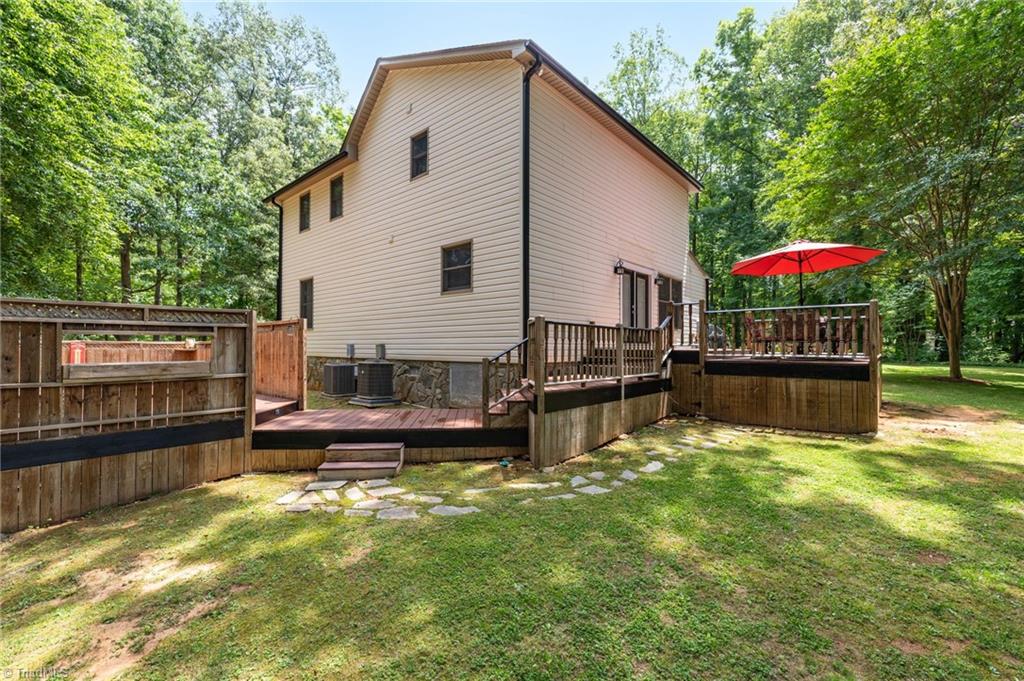 2800 Spencers Grove Road Browns Summit, NC 27214 - Photo 40 of 49 Back side of home showing all the glory.